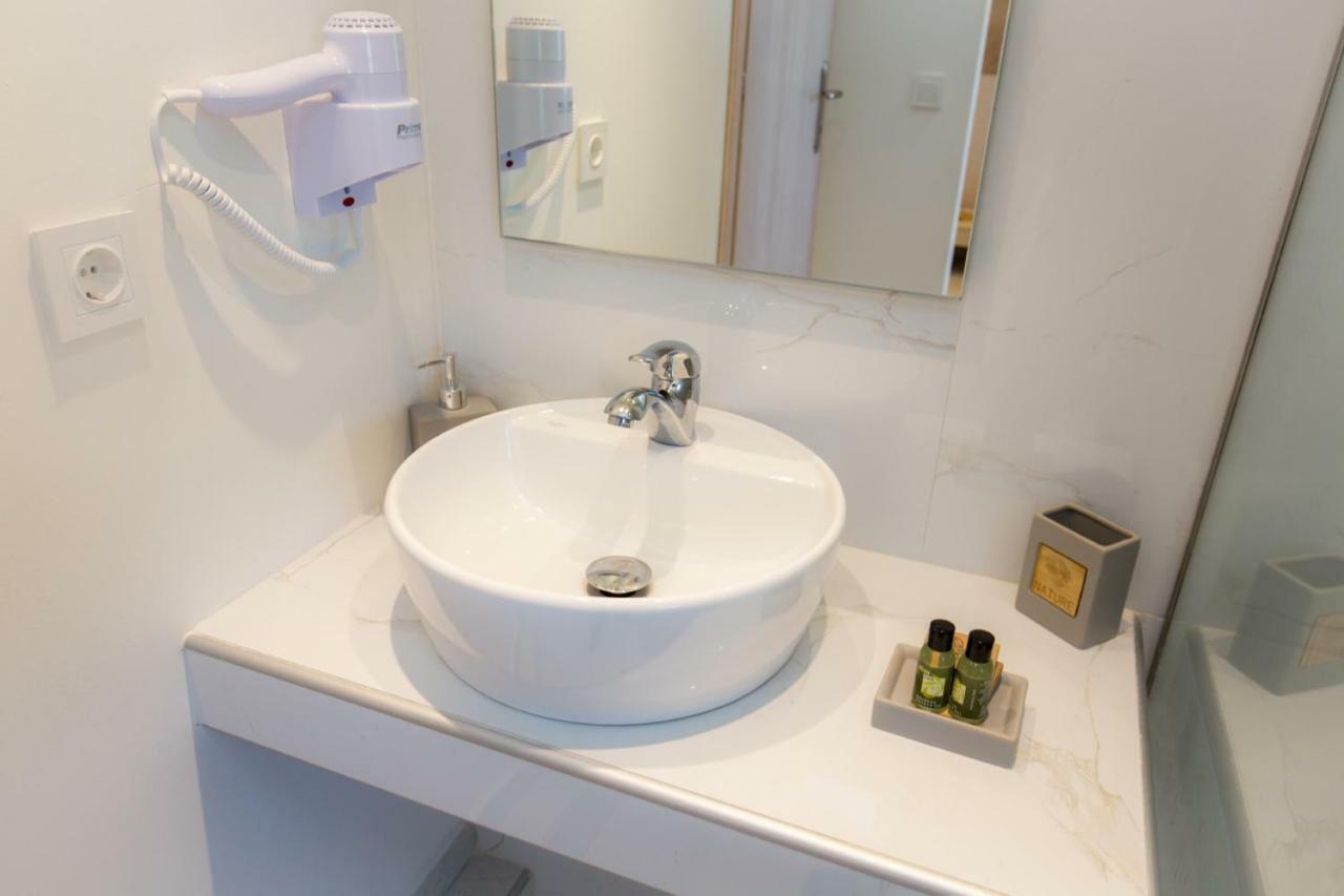 Estian Deluxe Apartment Лименария Екстериор снимка